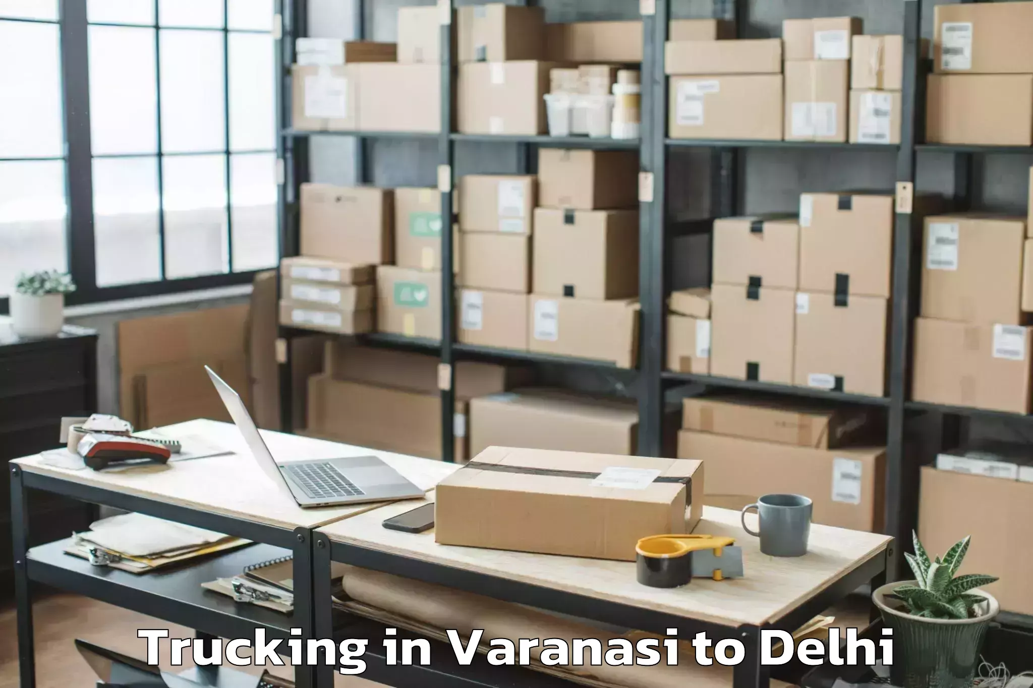 Book Varanasi to Dlf Promenade Mall Trucking Online